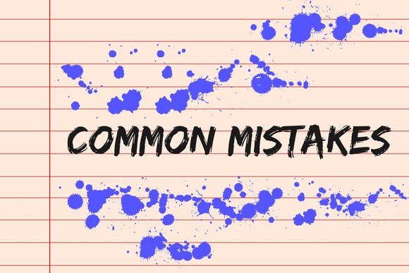 lined paper on which are the words common mistakes as well as some purple ink spills