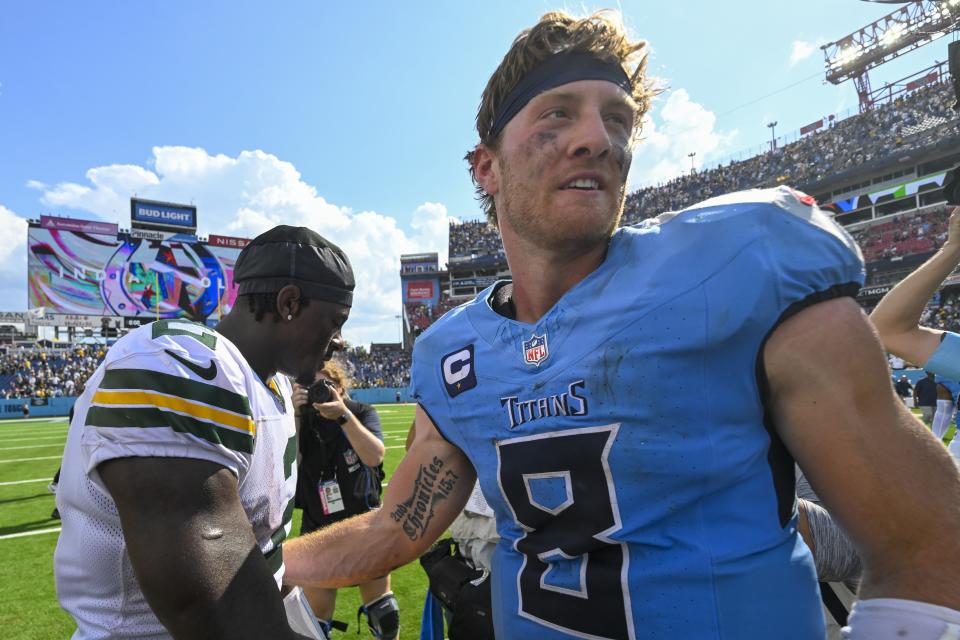 Green Bay Packers' Malik Willis talks to Tennessee Titans' Will Levis after an NFL football game Sunday, Sept. 22, 2024, in Nashville, Tenn. (AP Photo/John Amis)