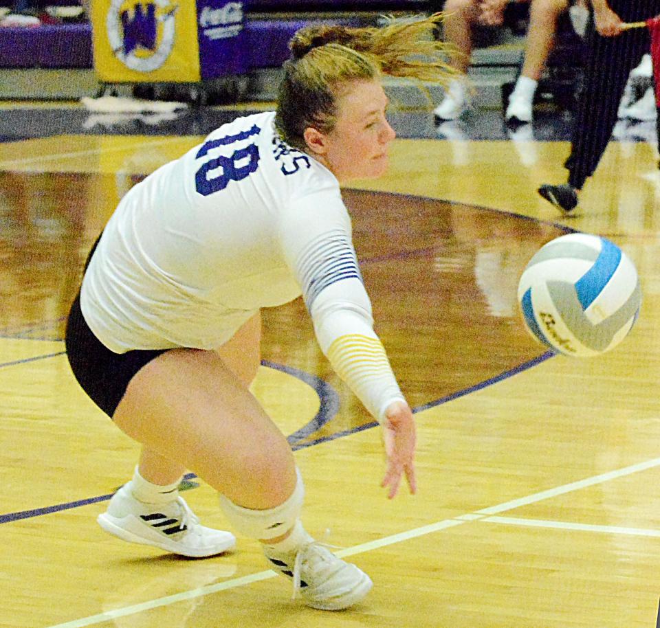 Watertown's Paige McAreavey reaches out in an attempt to keep the ball alive during an Eastern South Dakota Conference volleyball match against Brandon Valley Thursday night in the Civic Arena. The Arrows won 3-2.