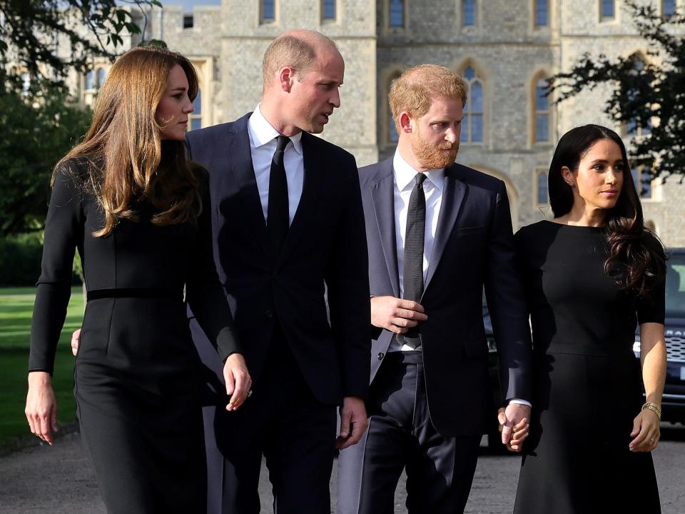 Catherine, Princess of Wales, Prince William, Prince of Wales, Prince Harry, Duke of Sussex, and Meghan, Duchess of Sussex on the long Walk at Windsor Castle arrive to view flowers and tributes to HM Queen Elizabeth on Saturday.