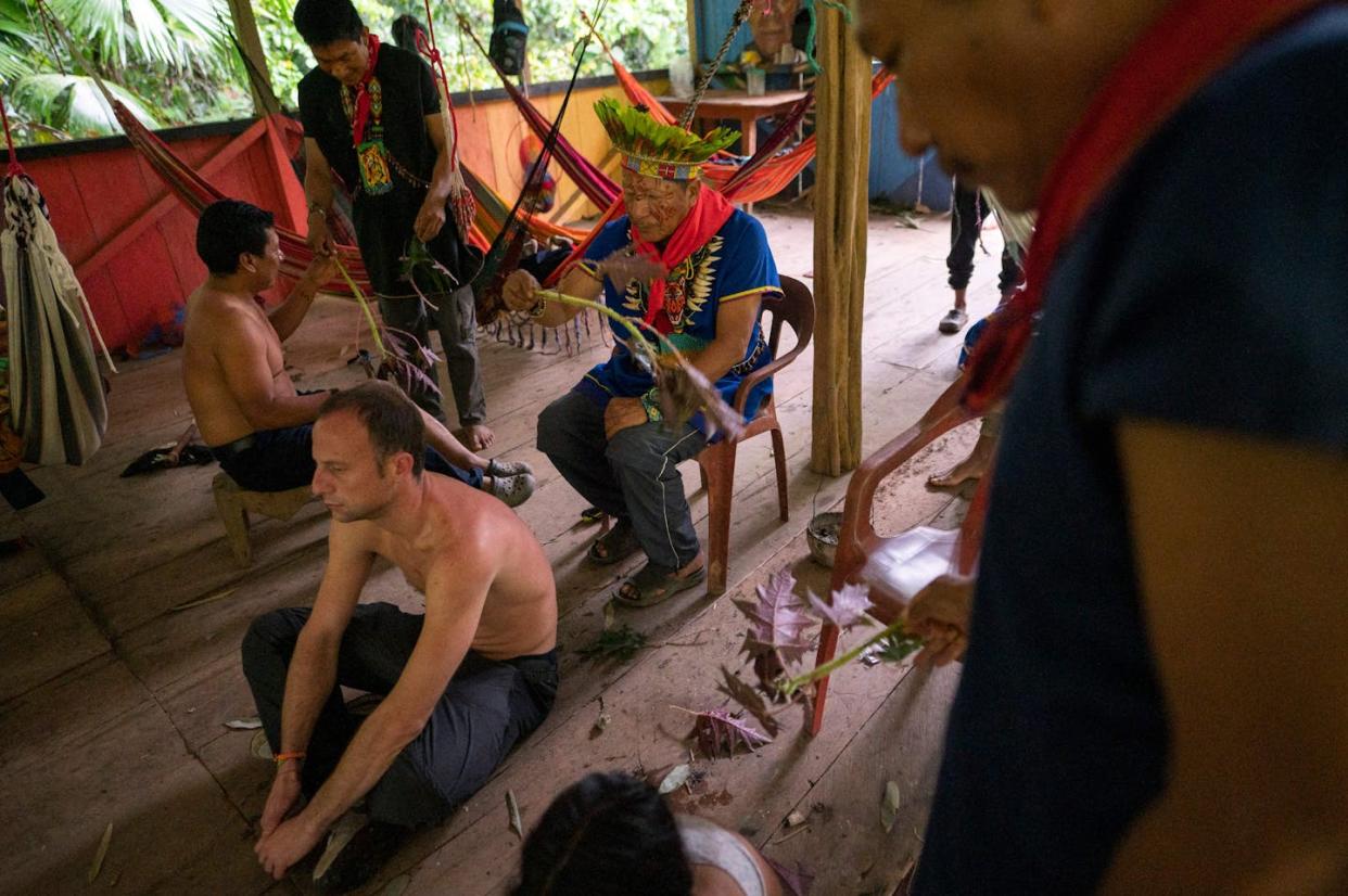 A healer conducts an ayahuasca drinking ceremony in Avie village, in Ecuador, on Jan.14, 2023. <a href="https://www.gettyimages.com/detail/news-photo/isidro-lucitante-a-healer-of-the-indigenous-cofan-ethnic-news-photo/1247423019?searchscope=image%2Cfilm&adppopup=true" rel="nofollow noopener" target="_blank" data-ylk="slk:Pedro Pardo / AFP via Getty images;elm:context_link;itc:0;sec:content-canvas" class="link ">Pedro Pardo / AFP via Getty images</a>