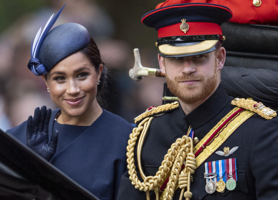 Prince Harry and Meghan Markle wave at crowds at Trooping of the Colour 2019