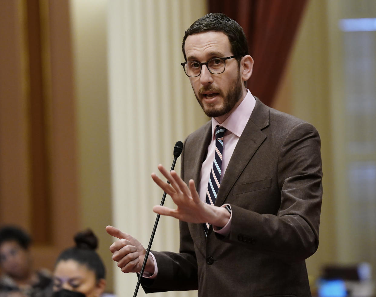 FILE - California state Sen. Scott Wiener, D-San Francisco, speaks on a measure at the Capitol in Sacramento, Calif., on March 31, 2022. Wiener announced, Wednesday, Aug. 31, 2022, that he will not put his bill up for a vote that would have allowed teens age 15 and up to get the coronavirus vaccine without parental consent, saying it didn't have enough support to clear the state Assembly. (AP Photo/Rich Pedroncelli, File)