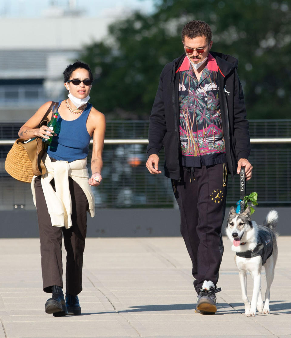 <p>Zoë Kravitz and husband Karl Glusman head out to catch their flight at JFK airport on Monday in N.Y.C. with their dog Scout.</p>