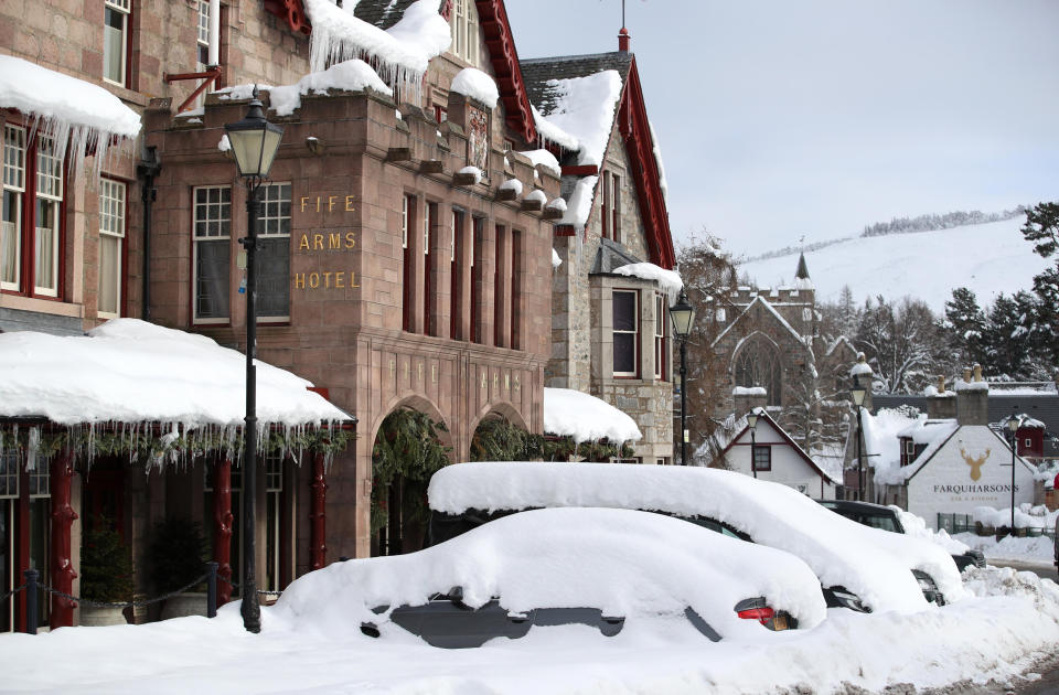 Cars covered in snow in Braemar, Aberdeenshire, which had an overnight temperature of minus 23.0C (minus 9.4F). The village, which is near Balmoral Castle, the summer residence of Queen Elizabeth II, recorded the lowest temperature in the UK in more than two decades, following an 