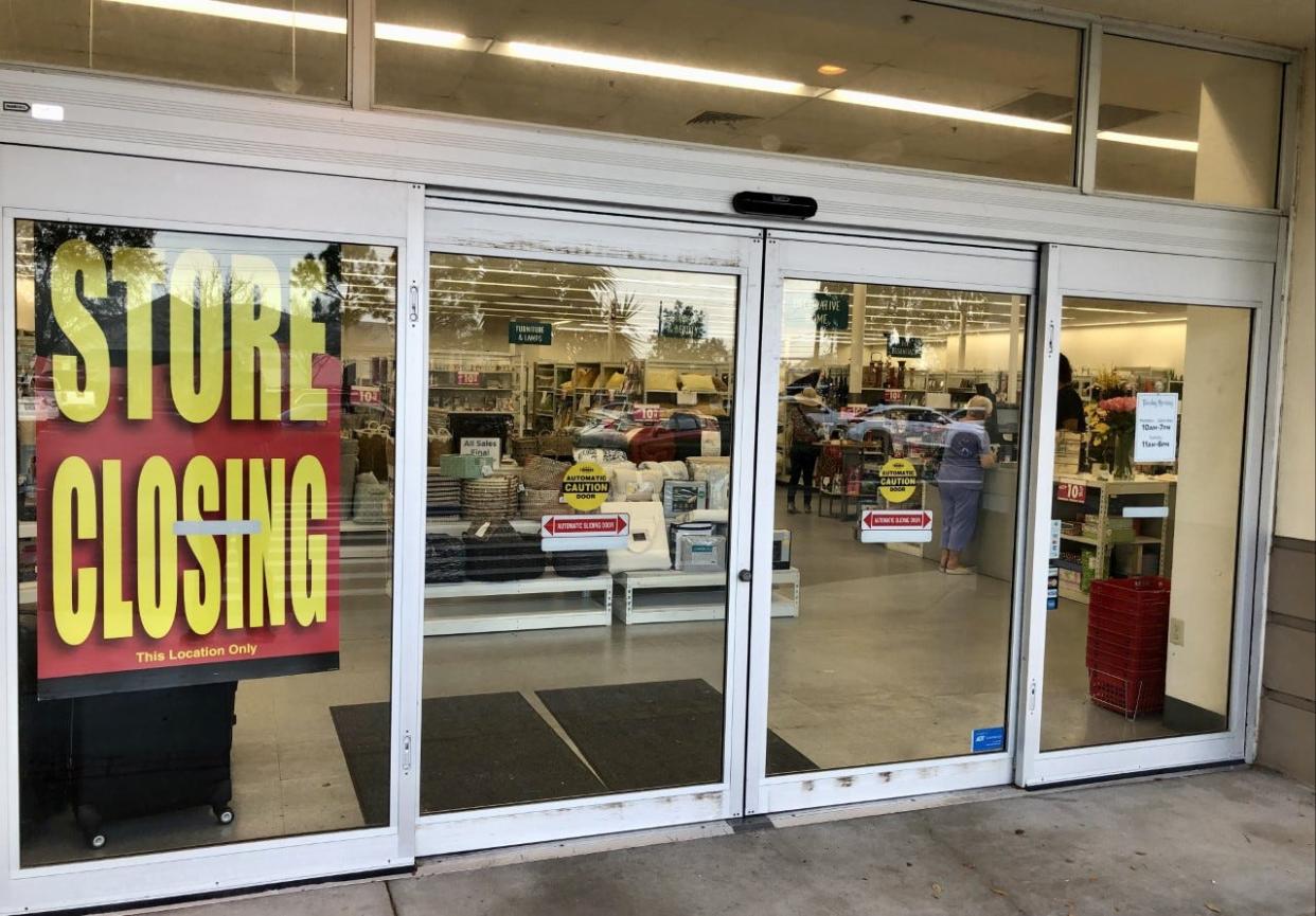 A sign on the door of Tuesday Morning's store in Suntree Plaza indicates that it is among those that will close.