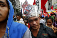 <p>Protesters rally near the U.S. Embassy in Manila to protest this weekend’s visit of U.S. President Donald Trump, Friday, Nov. 10, 2017, in Manila, Philippines. (Photo: Bullit Marquez/AP) </p>