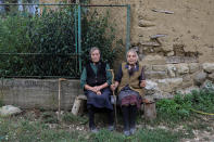 <p>Two elderly women sit in front of their home in the village of Gornja Kamenica, near the southeastern town of Knjazevac, Serbia, Aug. 14, 2017. (Photo: Marko Djurica/Reuters) </p>