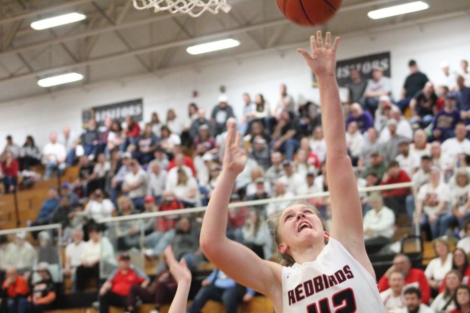 Loudonville's Alesha Felix finishes at the rim in the regional final.