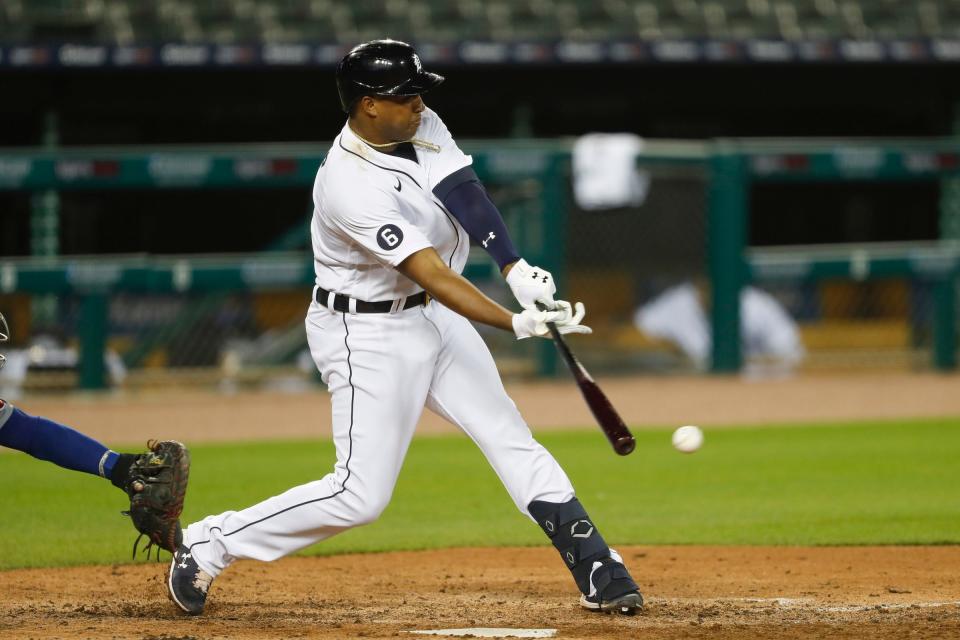Tigers second baseman Jonathan Schoop hits a RBI single during the sixth inning of the Tigers' 7-6 win over the Cubs on Wednesday, Aug. 26, 2020, at Comerica Park.