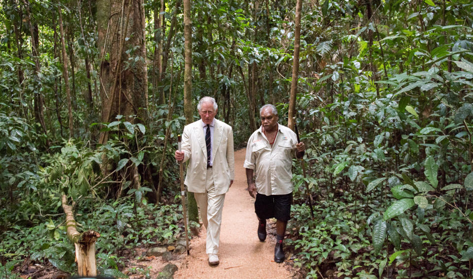 Britain's Prince Charles is accompanied by Roy Gibson, an elder of the Kuku Yalanji tribe, during a visit to the Daintree Rainforest in Australia April 8, 2018.  Arthur Edwards/Pool via Reuters