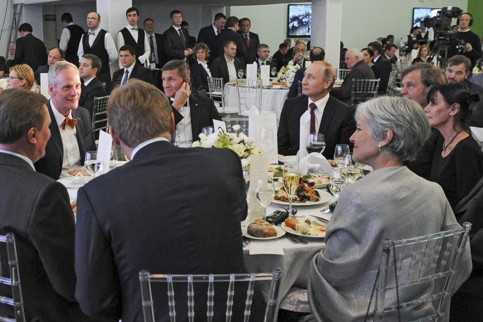 <span class="s1">Michael Flynn and Russian President Vladimir Putin, at center on back side of table, attend a 2015 event marking the 10th anniversary of RT, a Russian TV news channel, in Moscow. (Mikhail Klimentyev/Sputnik, Kremlin Pool/AP)</span>)