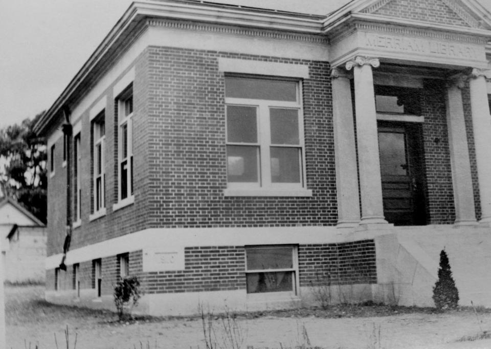 The Merriam Library, right, opened in 1911 next to Town Hall. The garage that can be glimpsed behind the building housed the town hearse.