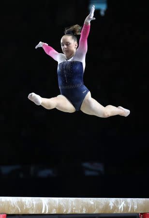 Oct 3, 2017; Montreal, Quebec, CAN; Amy Tinkler of Great Britain competes on the balance beam during the 47th FIG Artistic Gymnastics World Championship at Montreal Olympic Stadium. Mandatory Credit: Jean-Yves Ahern-USA TODAY Sports