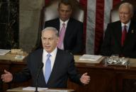 Israeli Prime Minister Benjamin Netanyahu addresses a joint meeting of Congress in the House Chamber on Capitol Hill in Washington, March 3, 2015. U.S. Speaker of the House John Boehner (L) (R-OH) and President pro tempore of the U.S. Senate Orrin Hatch (R-UT) look on from behind Netanyahu. REUTERS/Gary Cameron (UNITED STATES - Tags: POLITICS)