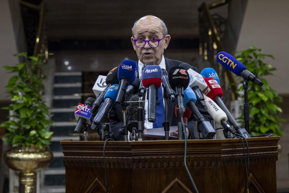 French Foreign Minister Jean-Yves Le Drian speaks during a press conference after a meeting with Muslim Grand Imam, Sheikh Ahmed el-Tayeb, at the headquarters of Al Azhar, in Cairo, Egypt, Sunday, Nov. 8, 2020. Le Drian visited Cairo on Sunday to meet with political and religious leaders in an effort to calm tensions and misunderstandings with the Arab and Muslim world following anti-French protests and three Islamic extremist attacks on France. (AP Photo/Nariman El-Mofty)