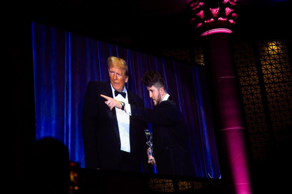 <br>Club president Gavin Wax greets Donald Trump onstage at the club’s annual gala, held at Cipriani Wall Street in Manhattan in December.