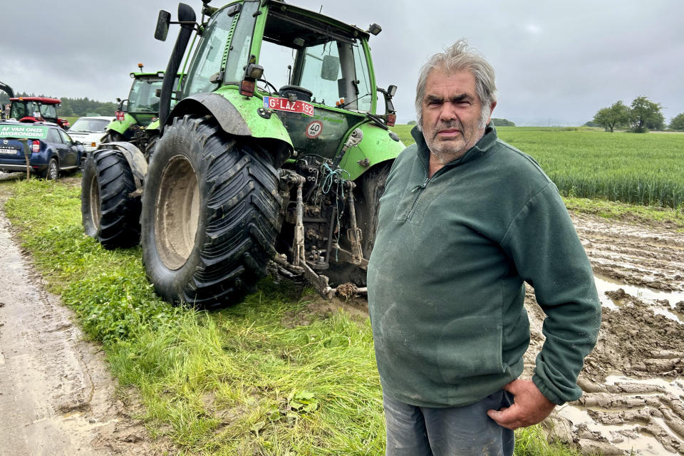 Farmer Eduard Van Overstraeten joins the Flemish Interest party and other farmers protesting changes in farming policy in Beersel, Belgium, Friday, May 31, 2024. Like other populist and hard right parties, the Flemish Interest Party has reached out to farmers ahead of the European Union parliamentary elections of June 6-9. Farming has turned out to be a pivotal election issue dividing right from left across the EU nations. (AP Photo/Raf Casert)