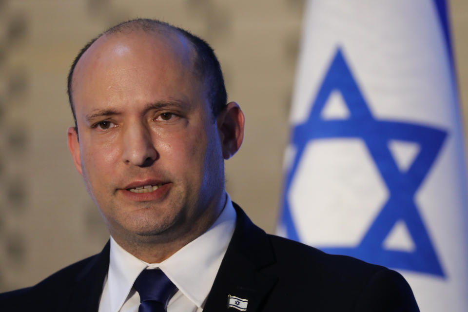 Israeli Prime Minister Naftali Bennett, speaks during a memorial ceremony for Israeli soldiers who fell in battle during the 2014 Gaza War, in the Hall of Remembrance at Mount Herzl Military Cemetery in Jerusalem, Israel, Sunday, June 20, 2021. (Abir Sultan/Pool Photo via AP)