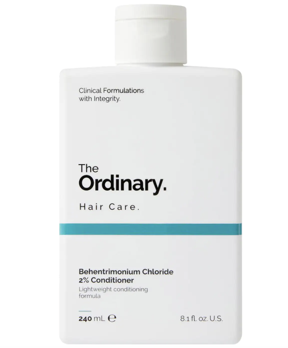 The Ordinary Behentrimonium Chloride 2% Conditioner in a white bottle with a blue band and black text (Photo via Sephora)