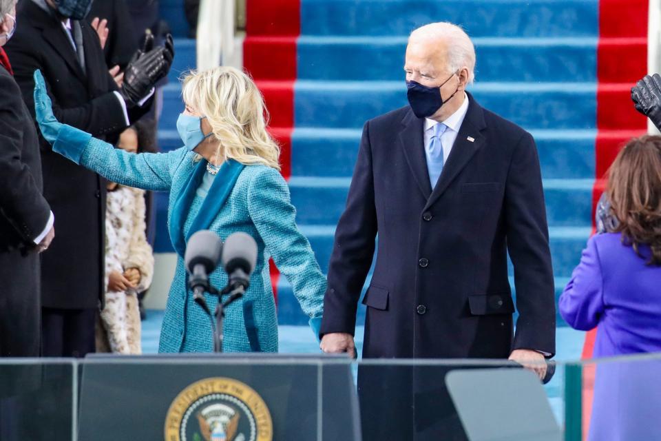<p>Jill Biden waves as she and her husband arrive at his inauguration ceremony. </p>