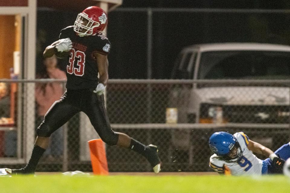 Oak Hills’ Karson Cox scores a touchdown against Serrano on Friday, Oct. 14, 2022.