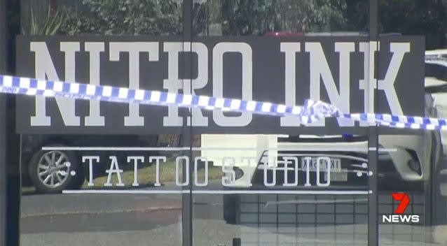 There were six people inside the Nitro Ink Tattoo Studio in Hampton Park, when two men in balaclavas pulled up in a silver sedan and opened fire. Source: 7 News
