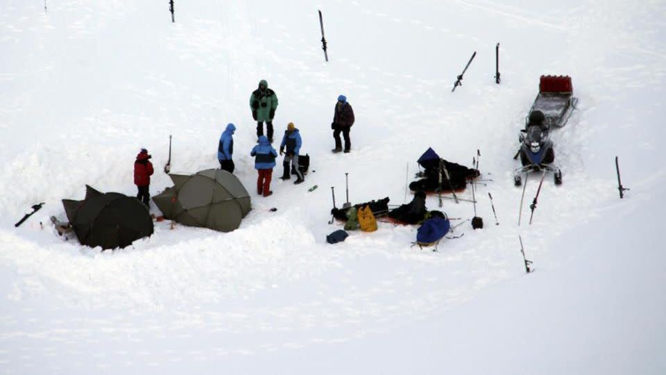 Tourists stand in the camp where a polar bear attacked in Svalbard, Norway. Source: Yahoo US