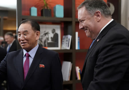 U.S. Secretary of State Mike Pompeo escorts Vice Chairman of the North Korean Workers' Party Committee Kim Yong Chol, North Korea's lead negotiator in nuclear diplomacy with the United States, into talks aimed at clearing the way for a second U.S.-North Korea summit as they meet at a hotel in Washington, U.S., January 18, 2019. REUTERS/Joshua Roberts