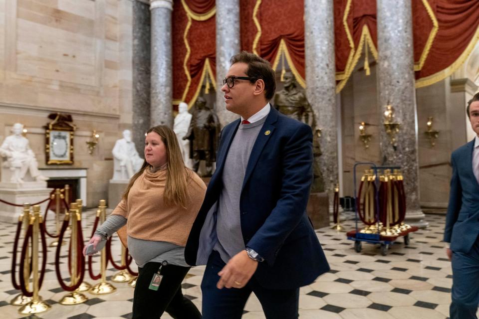 Rep.-elect George Santos, R-N.Y., walks through the Capitol as the House meets for a fourth day to elect a speaker and convene the 118th Congress in Washington, Friday, Jan. 6, 2023.