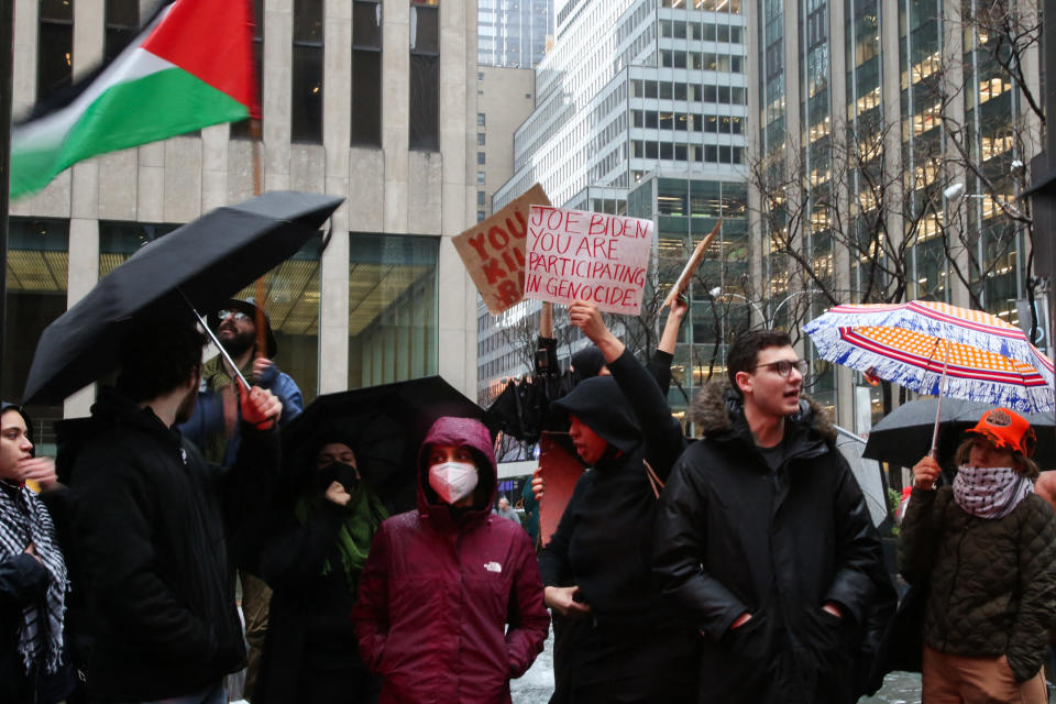 Pro-Palestinian protesters gather outside Radio City Music Hall.