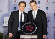 Social advocates and founders of charity Free the Children Craig (L) and Marc Kielburger pose beside their star during Canada's Walk of Fame induction ceremonies in Toronto, September 21, 2013. REUTERS/Mark Blinch (CANADA - Tags: ENTERTAINMENT SOCIETY)