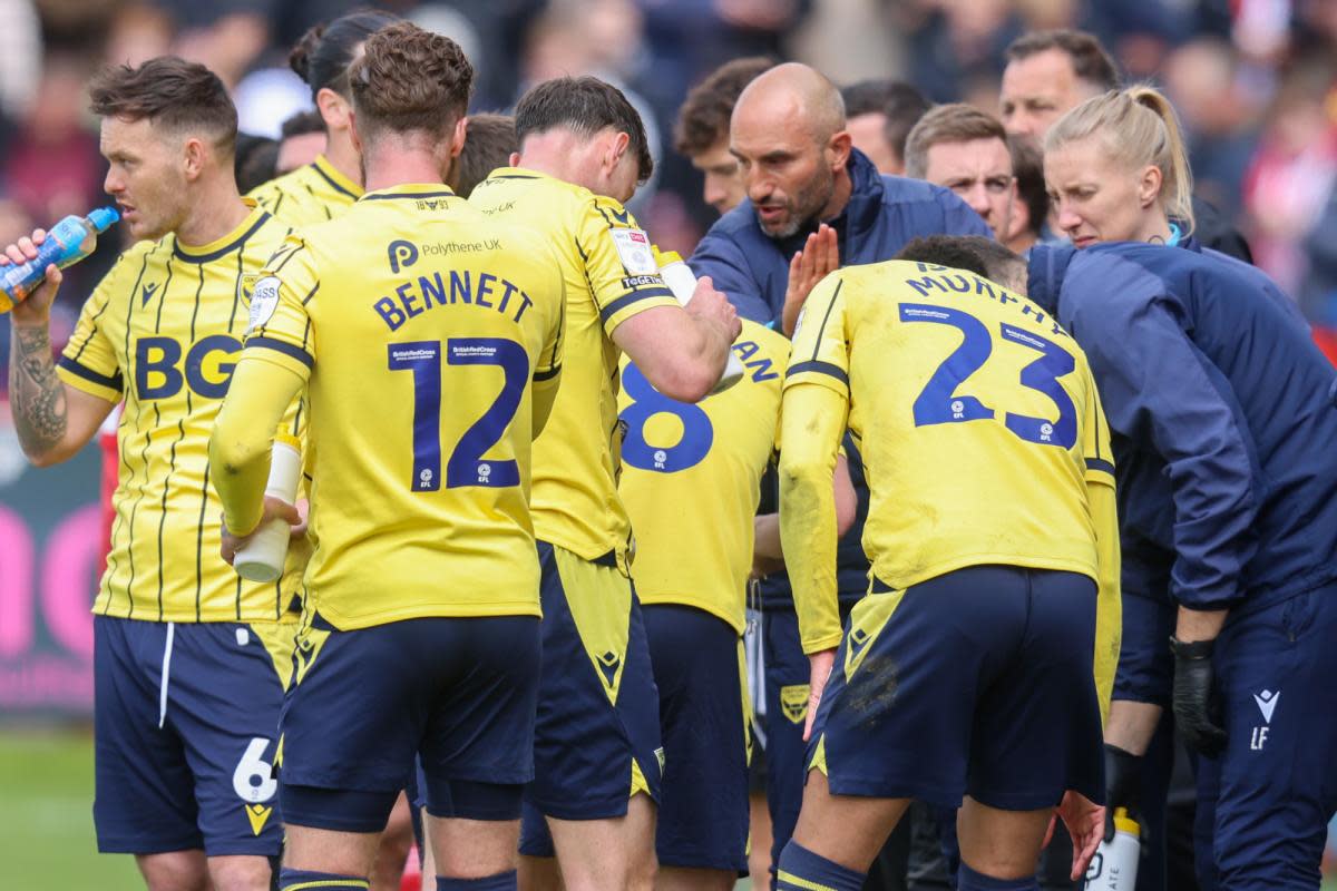 Oxford United players take on drinks and instructions during a break in play <i>(Image: Steve Edmunds)</i>