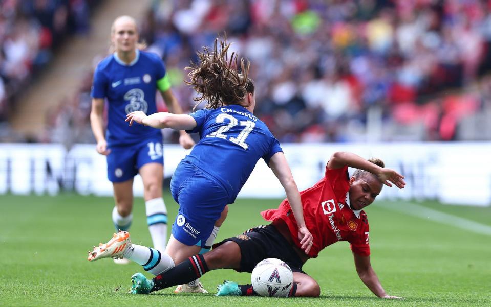 Niamh Charles of Chelsea and Nikita Paris of Manchester United battle for the ball - Getty