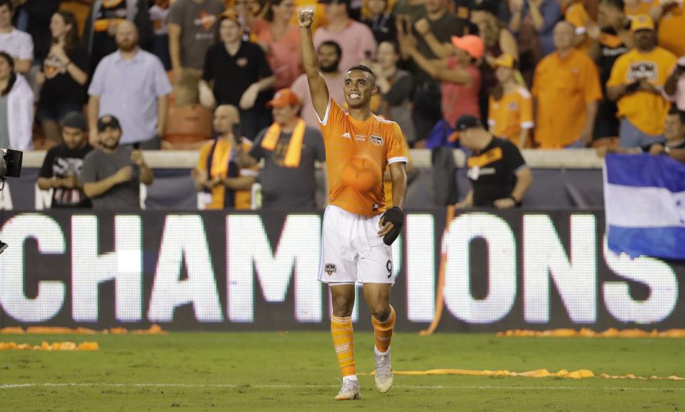 Houston Dynamo's Mauro Manotas celebrates after the U.S. Open Cup championship soccer match against the Philadelphia Union Wednesday, Sept. 26, 2018, in Houston. Houston Dynamo won 3-0. (AP Photo/David J. Phillip)