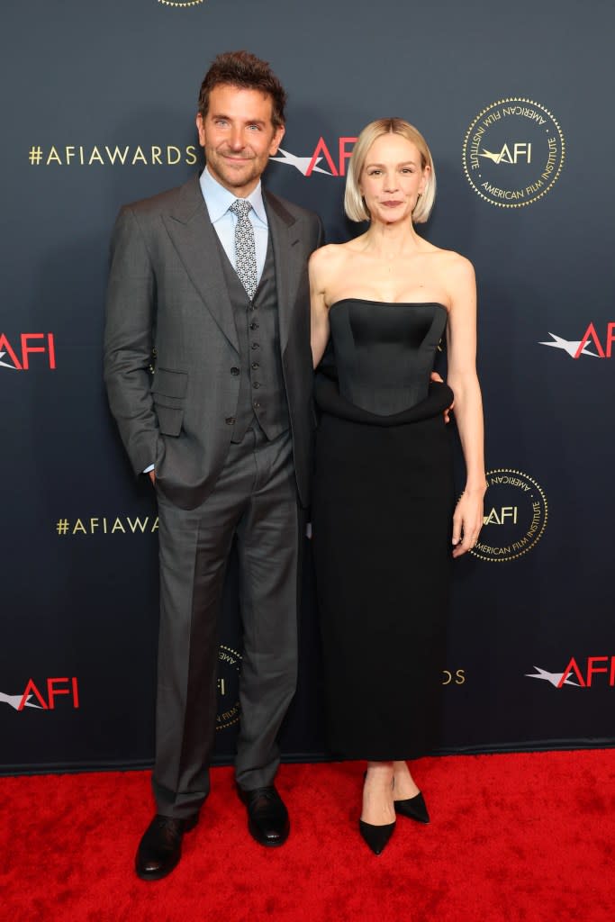 (L-R) Bradley Cooper and Carey Mulligan attend the AFI Awards Luncheon at Four Seasons Hotel Los Angeles at Beverly Hills on January 12, 2024 in Los Angeles, California.