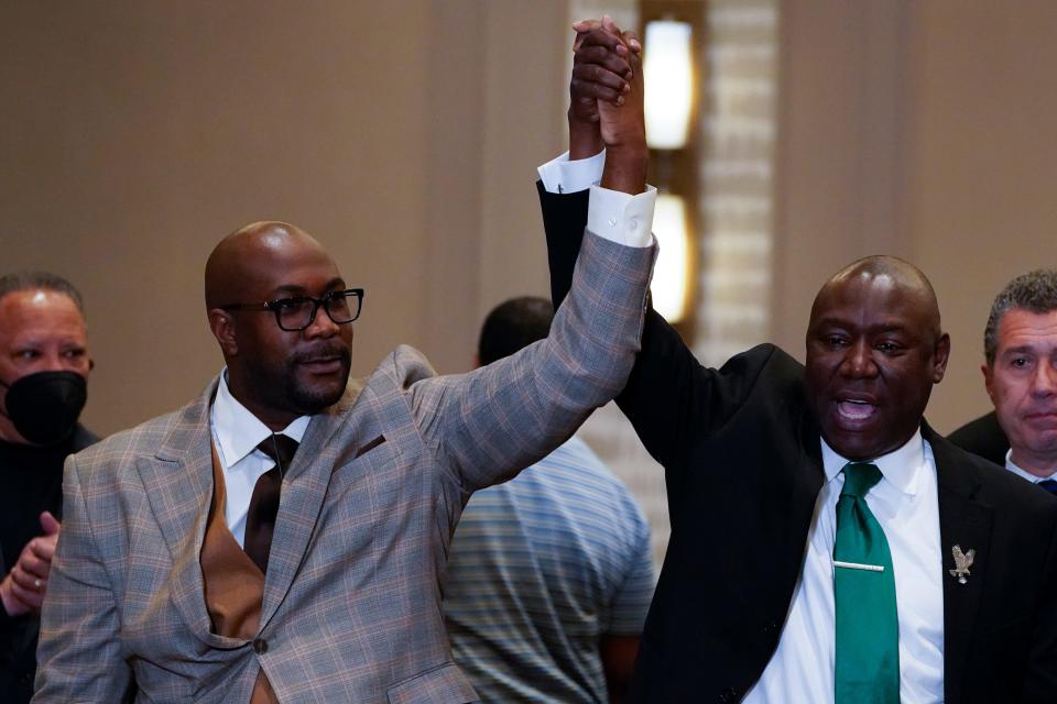 Philonise Floyd and Attorney Ben Crump, from left, react after a guilty verdict was announced at the trial of former Minneapolis police Officer Derek Chauvin for the 2020 death of George Floyd, Tuesday, April 20, 2021, in Minneapolis, Minn.