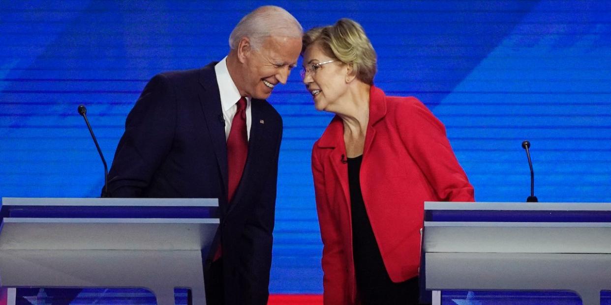 Former Vice President Joe Biden and Sen. Elizabeth Warren chat at the September Democratic debate.