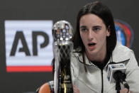 Iowa's Caitlin Clark speaks during a news conference announcing the AP NCAA Women's Coach and Player of the Year Thursday, April 4, 2024, in Cleveland. (AP Photo/Carolyn Kaster)