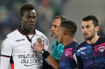 Football Soccer - Girondins Bordeaux v Nice - French Ligue 1 - Stade Matmut Atlantique, 21/12/2016. Mario Balotelli of Nice (L) reacts during his match against Girondins Bordeaux. REUTERS/Regis Duvignau