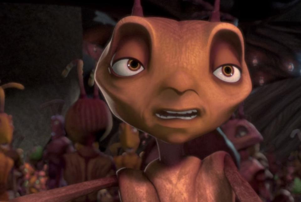 Animated character Z from the movie "Antz" with a surprised expression, surrounded by other ants