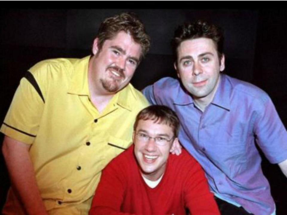 Hughes (right) with ‘Never Mind the Buzzcocks‘ regulars Phill Jupitus (left) and Mark Lamarr (BBC)