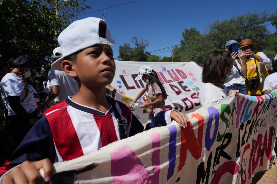 Migrants seeking asylum march through the streets of Nogales, Sonora to protest Title 42, Border Patrol abuse against migrants, and lack of access to health care in Nogales. The protest on Monday, Sept. 26, 2022 followed the World Day of Migrants and Refugees.