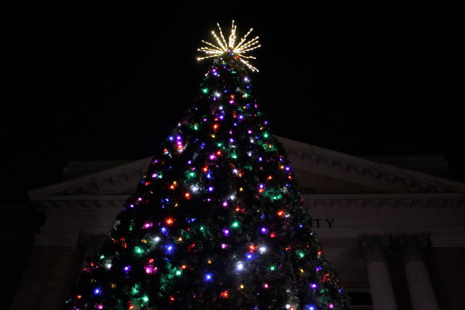 Hundreds gathered at the Historic Courthouse Plaza in Hendersonville Friday, Nov. 26, 2021 awaiting the arrival of Santa Claus and to see the lights on the Christmas tree come to life.