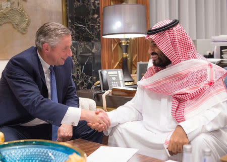 Saudi Crown Prince Mohammed bin Salman shakes hands with Klaus Kleinfeld after Kleinfeld was appointed as NEOM's Chief Executive Officer, in Riyadh, Saudi Arabia October 24, 2017. Saudi Press Agency/Handout via REUTERS ATTENTION EDITORS - THIS PICTURE WAS PROVIDED BY A THIRD PARTY. NO RESALES. NO ARCHIVE.