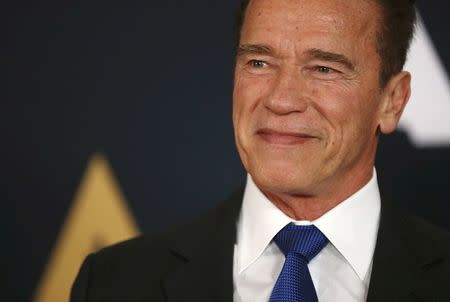 Actor Arnold Schwarzenegger arrives at the 8th Annual Governors Awards in Los Angeles, California, U.S., November 12, 2016. REUTERS/Mario Anzuoni