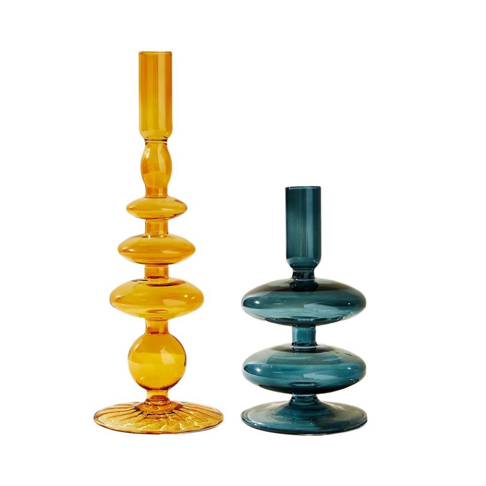 <p><a href="https://go.redirectingat.com?id=74968X1596630&url=https%3A%2F%2Fwww.anthropologie.com%2Fshop%2Fdelaney-candle-holder&sref=https%3A%2F%2Fwww.elle.com%2Ffashion%2Fshopping%2Fg44755623%2Fbest-home-decor-gifts%2F" rel="nofollow noopener" target="_blank" data-ylk="slk:Shop Now;elm:context_link;itc:0;sec:content-canvas" class="link ">Shop Now</a></p><p>Delaney Candle Holder</p><p>anthropologie.com</p><p>$20.00</p>