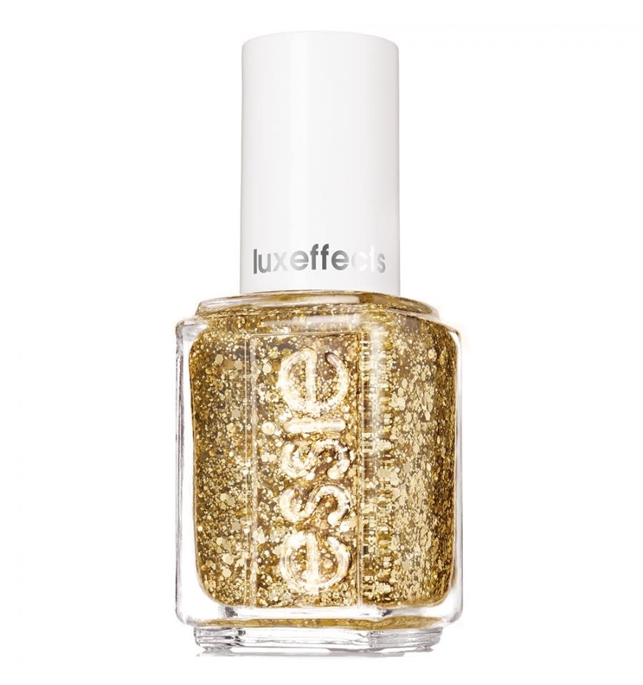 <p>Go for a confetti effect with one coat, or layer it on for a full-on gilded manicure. <a href="http://www.essie.com/effects/luxeffects/rock-at-the-top.aspx" rel="nofollow noopener" target="_blank" data-ylk="slk:Essie Rock at the Top;elm:context_link;itc:0;sec:content-canvas" class="link ">Essie Rock at the Top</a> ($9)</p>
