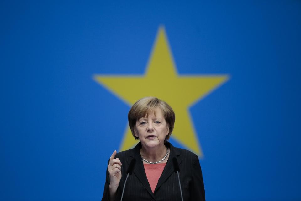 German Chancellor Angela Merkel delivers her keynote speech during the German ruling Christian Democratic Union party's convention ahead of the European Parliament elections in Berlin, Saturday, April 5, 2014. European Parliament elections are scheduled for May 2014. (AP Photo/Markus Schreiber)