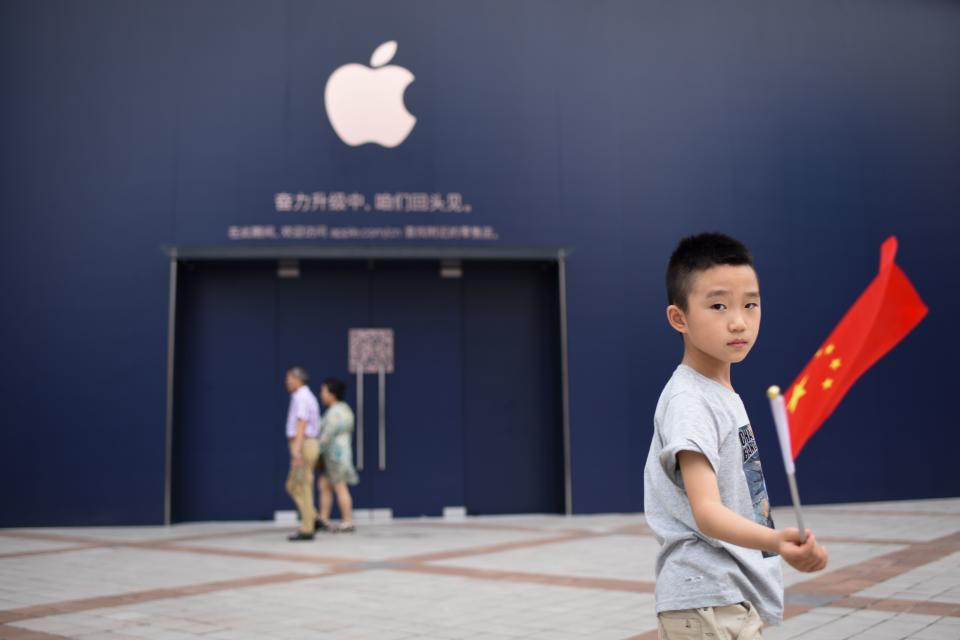 Apple has built major footprints in China from online to physical stores. (Getty/AFP)